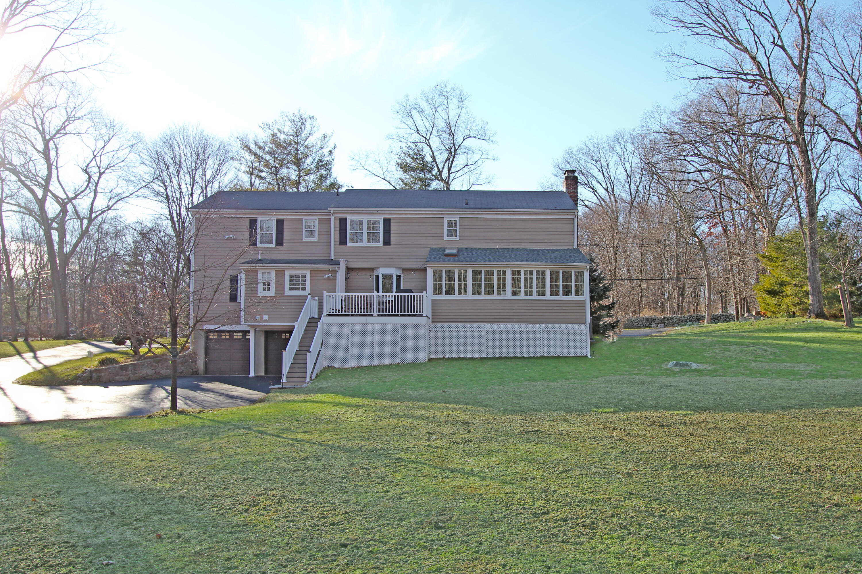 547 Cheese Spring Road New Canaan, CT 06840 - Photo 28 of 33 a view of a house with a yard
