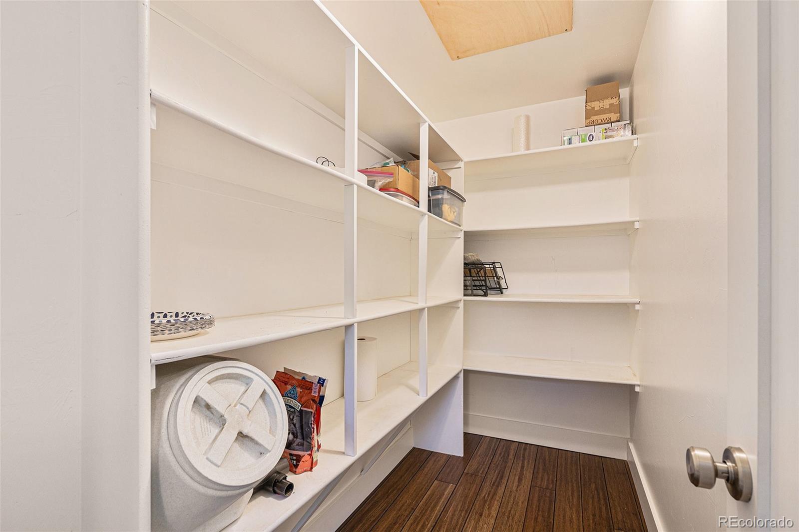 4650 Forest Hill Road Evergreen, CO 80439 - Photo 14 of 36 a view of walk in closet with empty racks