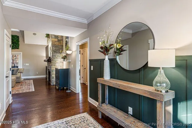 a bedroom with a bed and a table