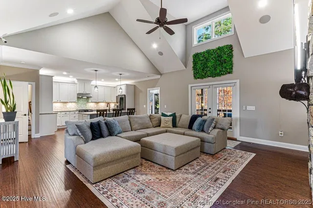 a living room with furniture and a rug