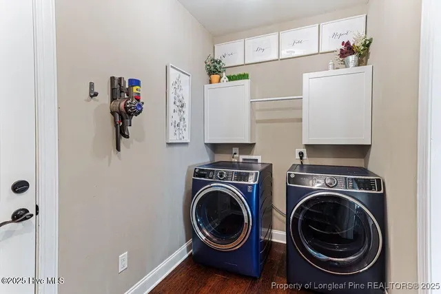a kitchen with an oven a refrigerator and cabinets