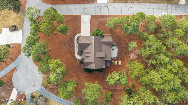 an aerial view of houses with yard