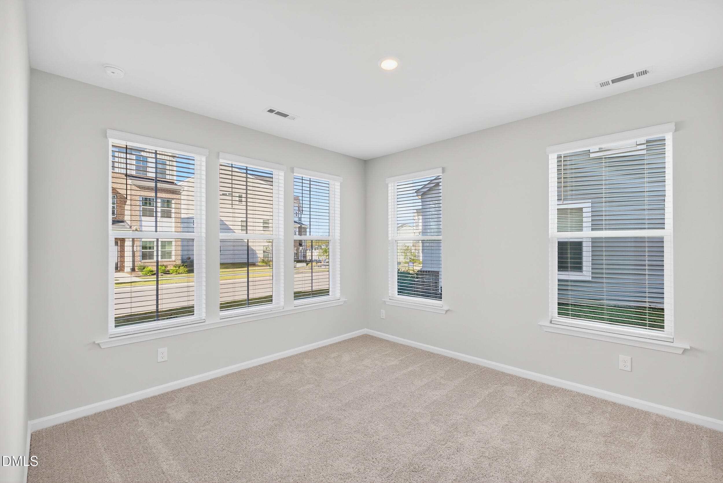 335 Chesapeake Commons Street Garner, NC 27529 - Photo 15 of 20 an empty room with a window