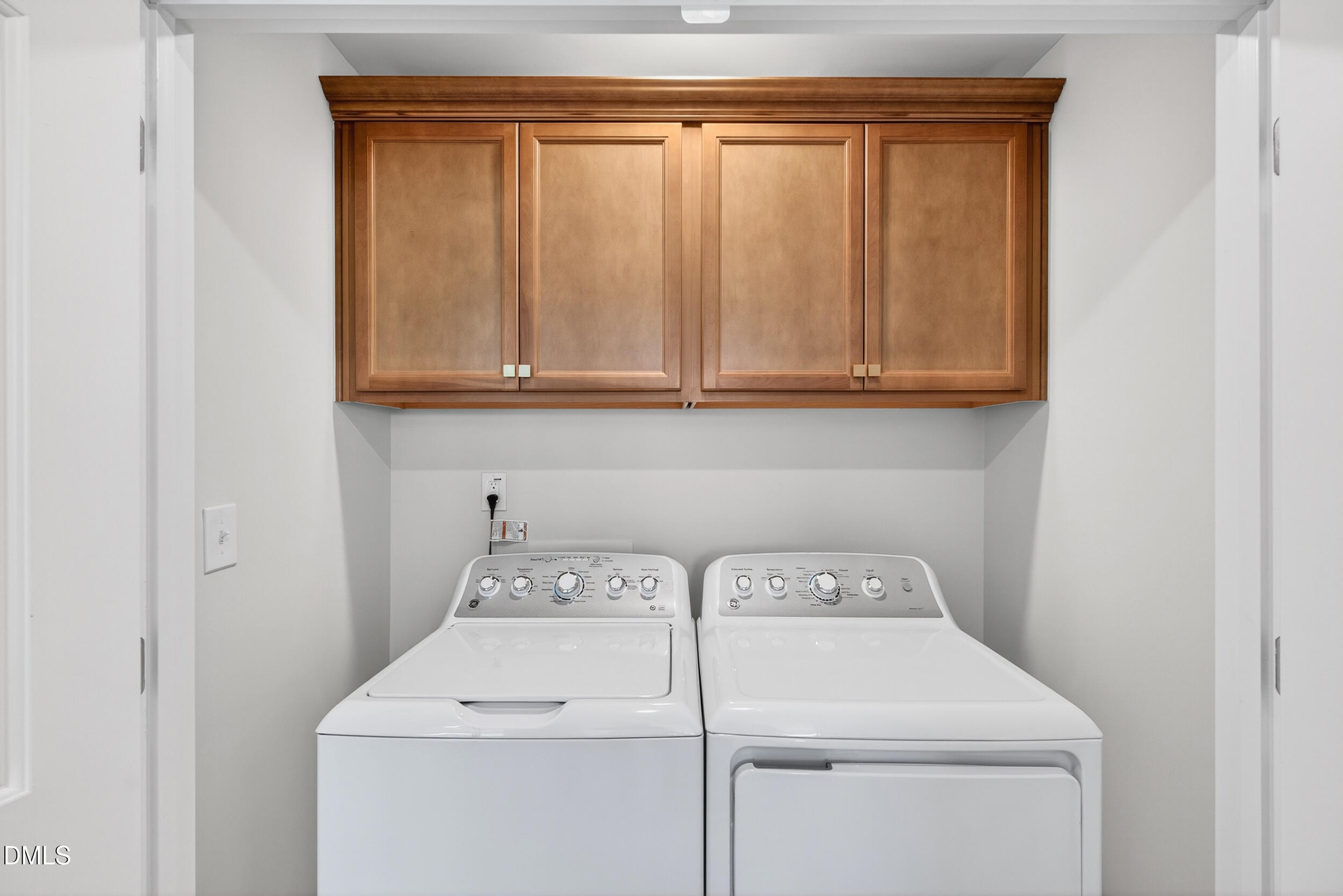 335 Chesapeake Commons Street Garner, NC 27529 - Photo 17 of 20 a utility room with dryer and washer