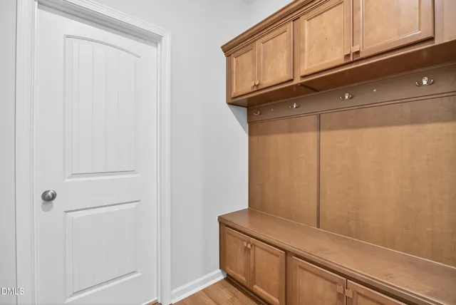 a view of storage and utility room with cabinet