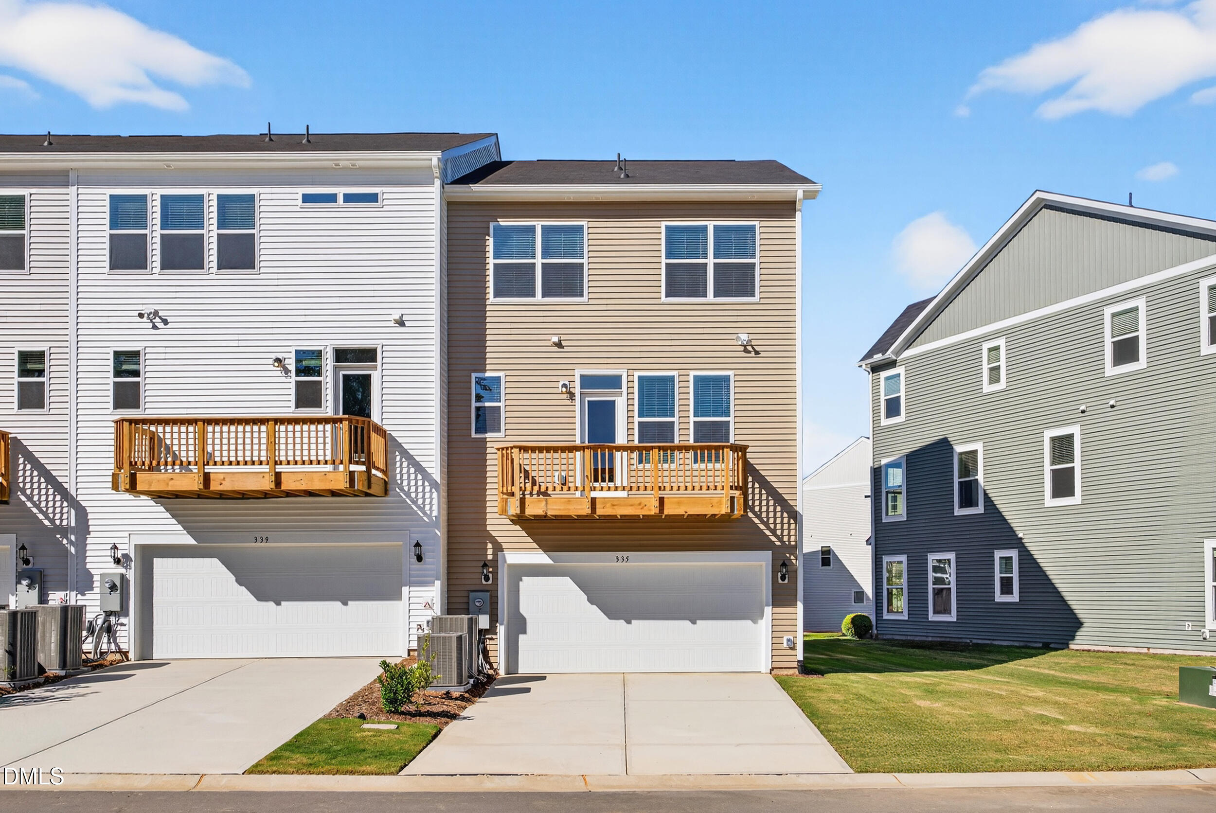 335 Chesapeake Commons Street Garner, NC 27529 - Photo 20 of 20 a view of a building with a patio