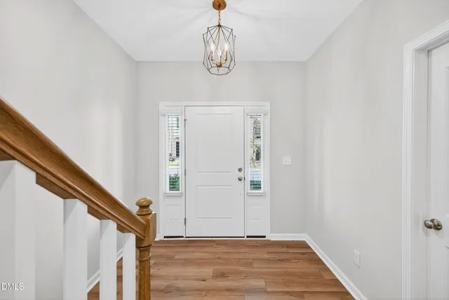 a view of entryway with wooden floor