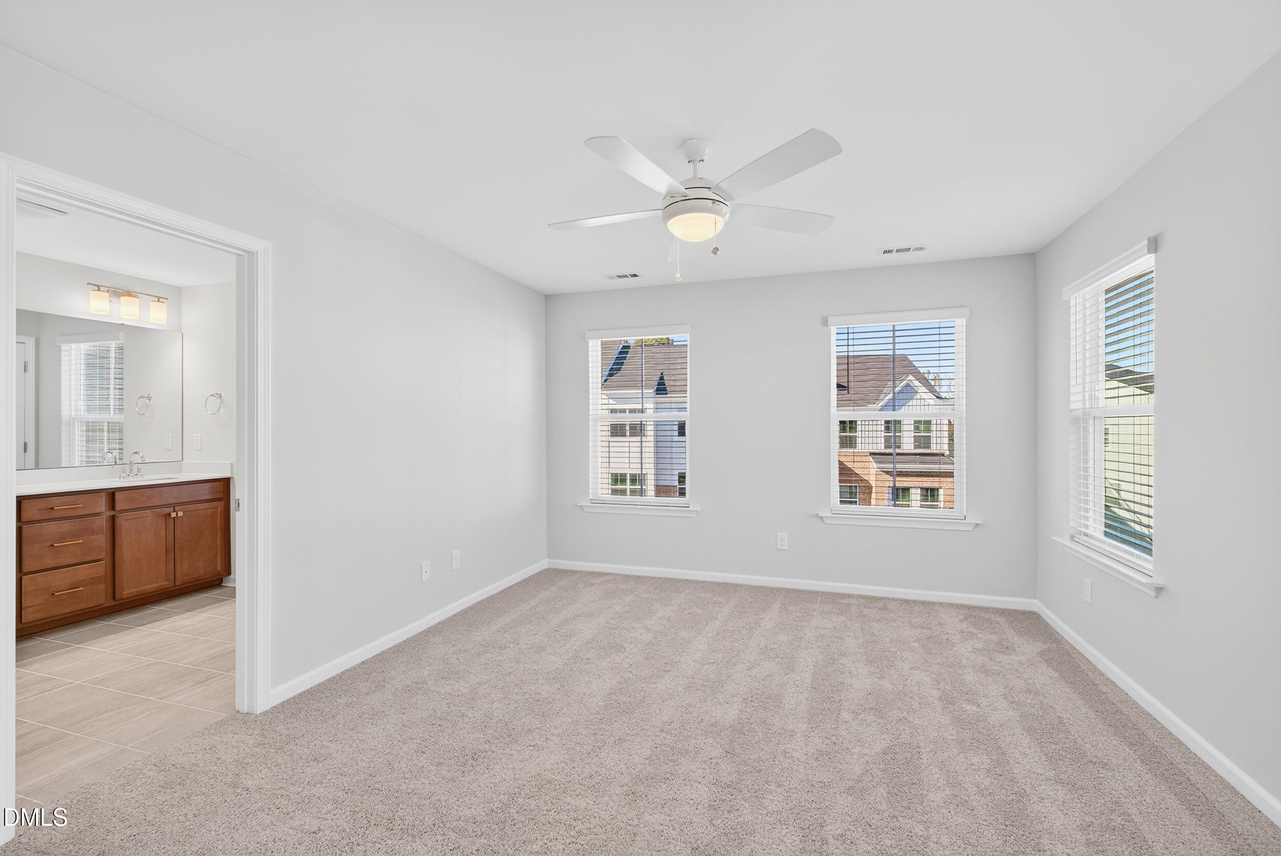 335 Chesapeake Commons Street Garner, NC 27529 - Photo 10 of 20 a view of an empty room with a window