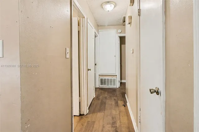 a view of a bathroom from the hallway