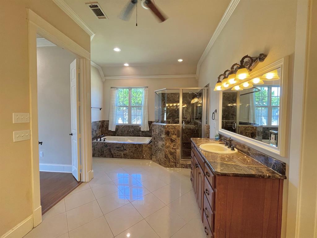 4026 Howard Road Waxahachie, TX 75165 - Photo 31 of 37 a bathroom with sink shower and mirror