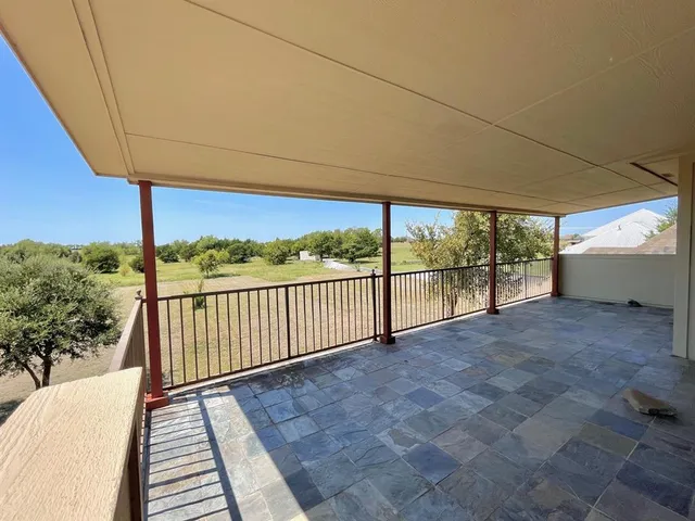 a view of a room with a balcony