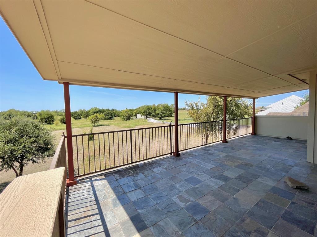 4026 Howard Road Waxahachie, TX 75165 - Photo 5 of 37 a view of a room with a balcony