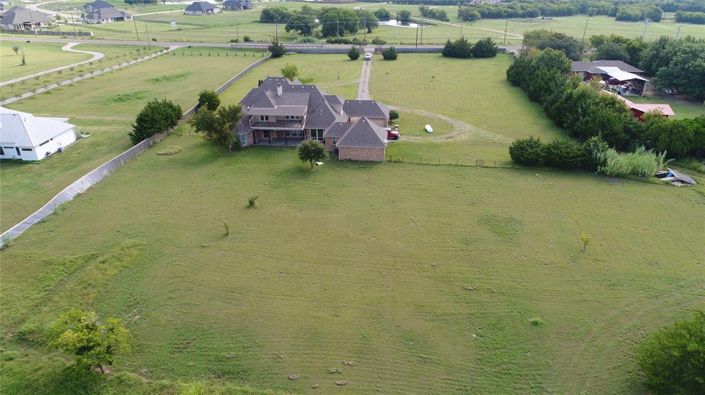4026 Howard Road Waxahachie, TX 75165 - Photo 6 of 37 a aerial view of a house with a lake view