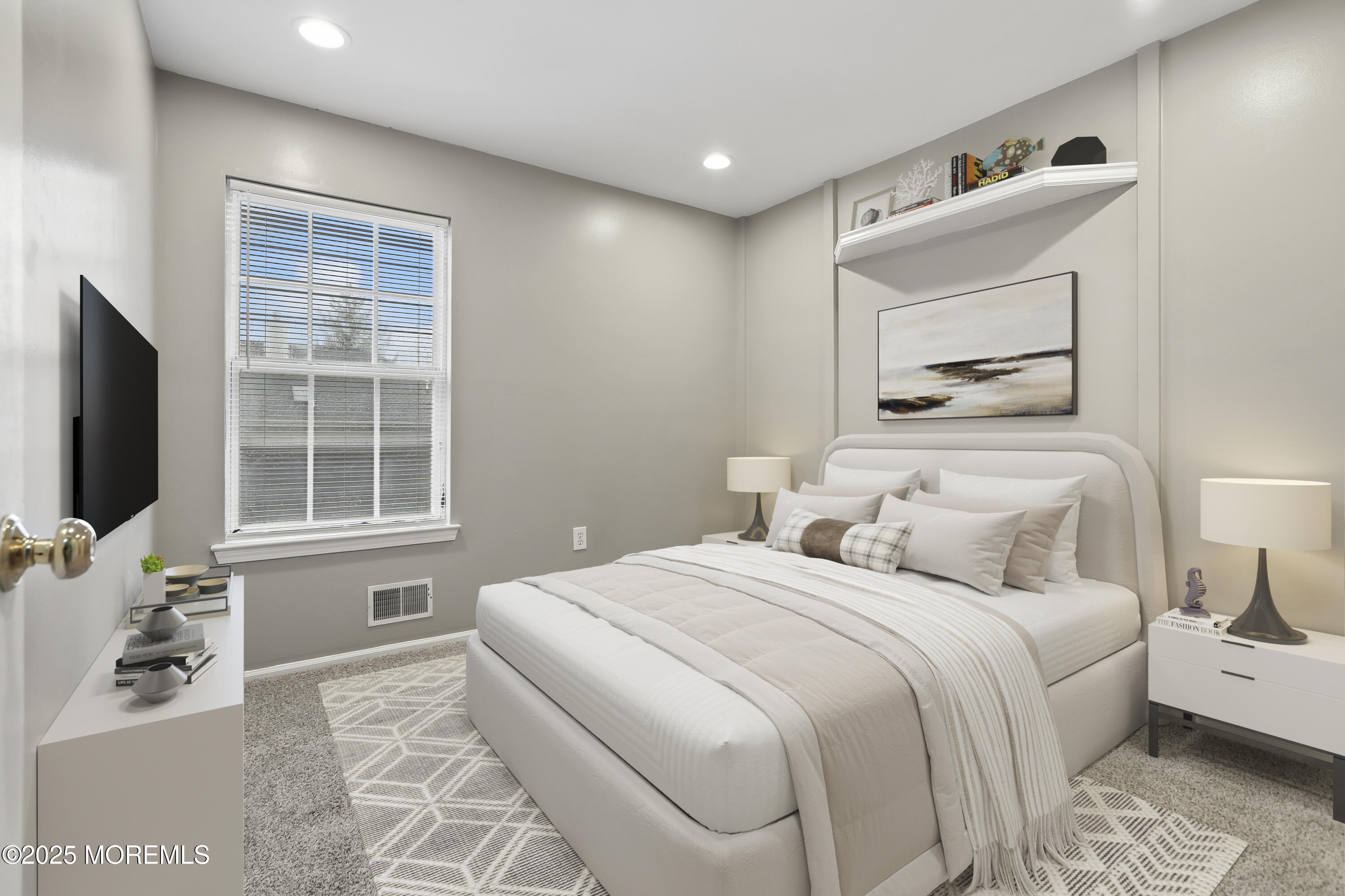 1707 Ridgeview Court, Unit 1707 Parlin, NJ 08859 - Photo 15 of 22 a bedroom with a bed and a flat screen tv