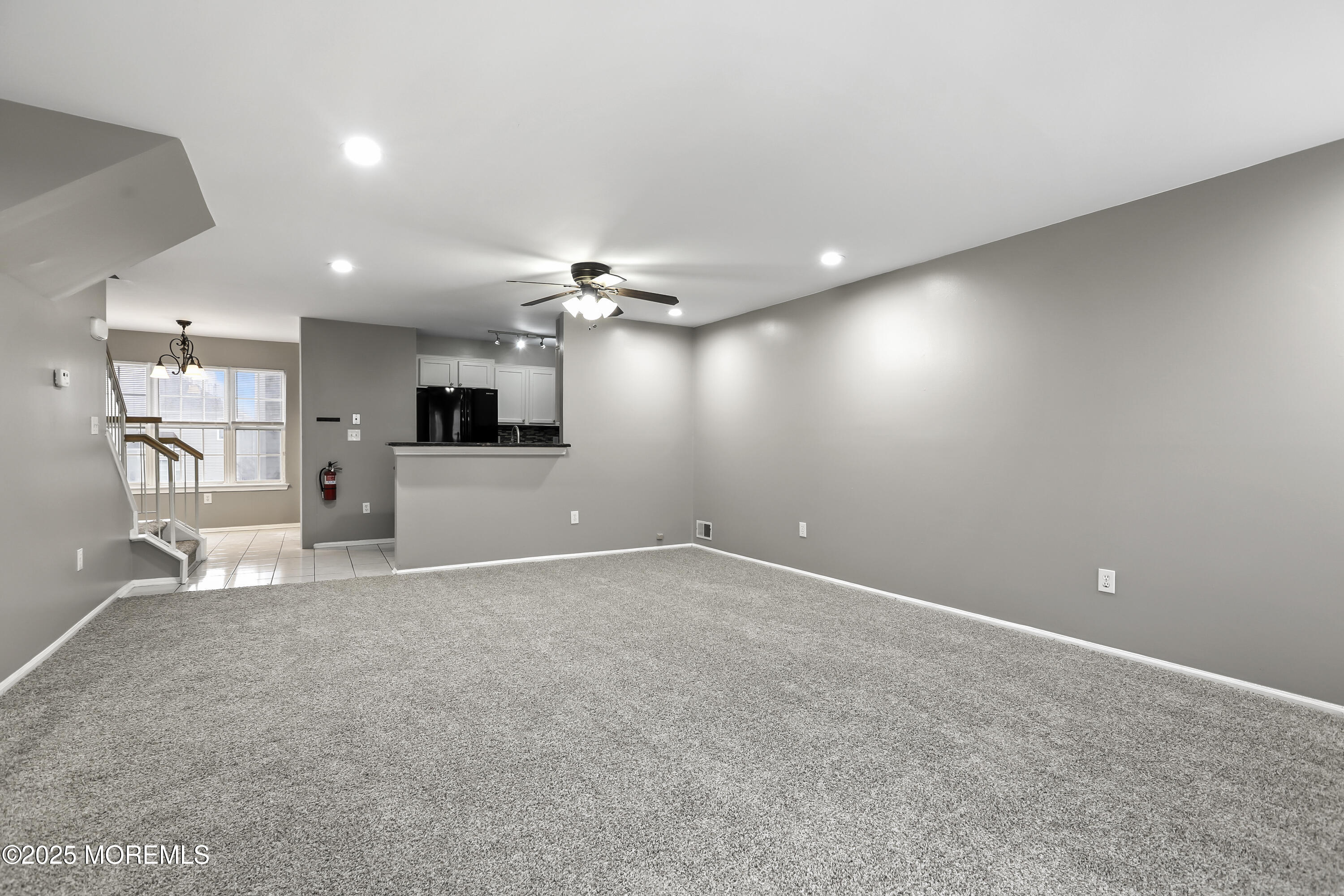 1707 Ridgeview Court, Unit 1707 Parlin, NJ 08859 - Photo 5 of 22 a view of a kitchen with a sink and a refrigerator