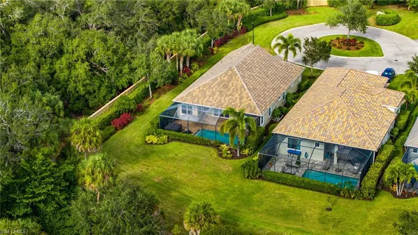 a view of swimming pool with a backyard