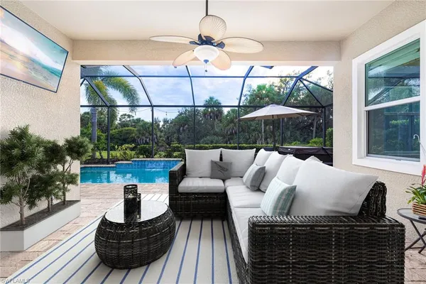 a view of balcony with furniture