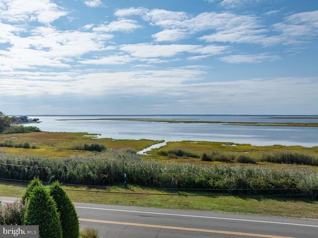 a view of a balcony with furniture