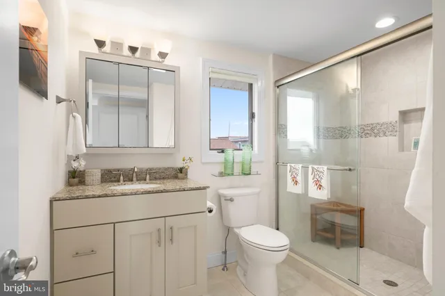 a room with gym equipment and windows