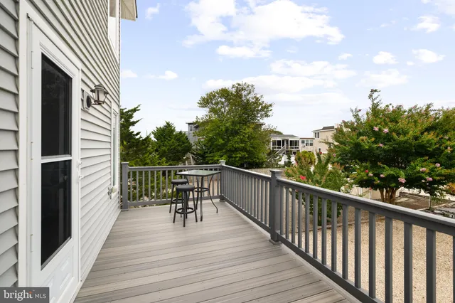 an aerial view of a house with a yard and garden