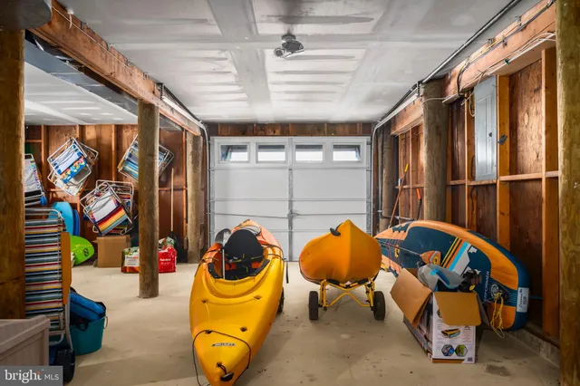 an aerial view of a house with swimming pool and mountain view