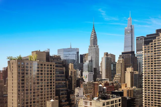 a view of city with tall buildings