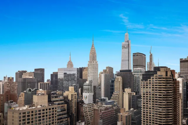 a view of a city with tall buildings