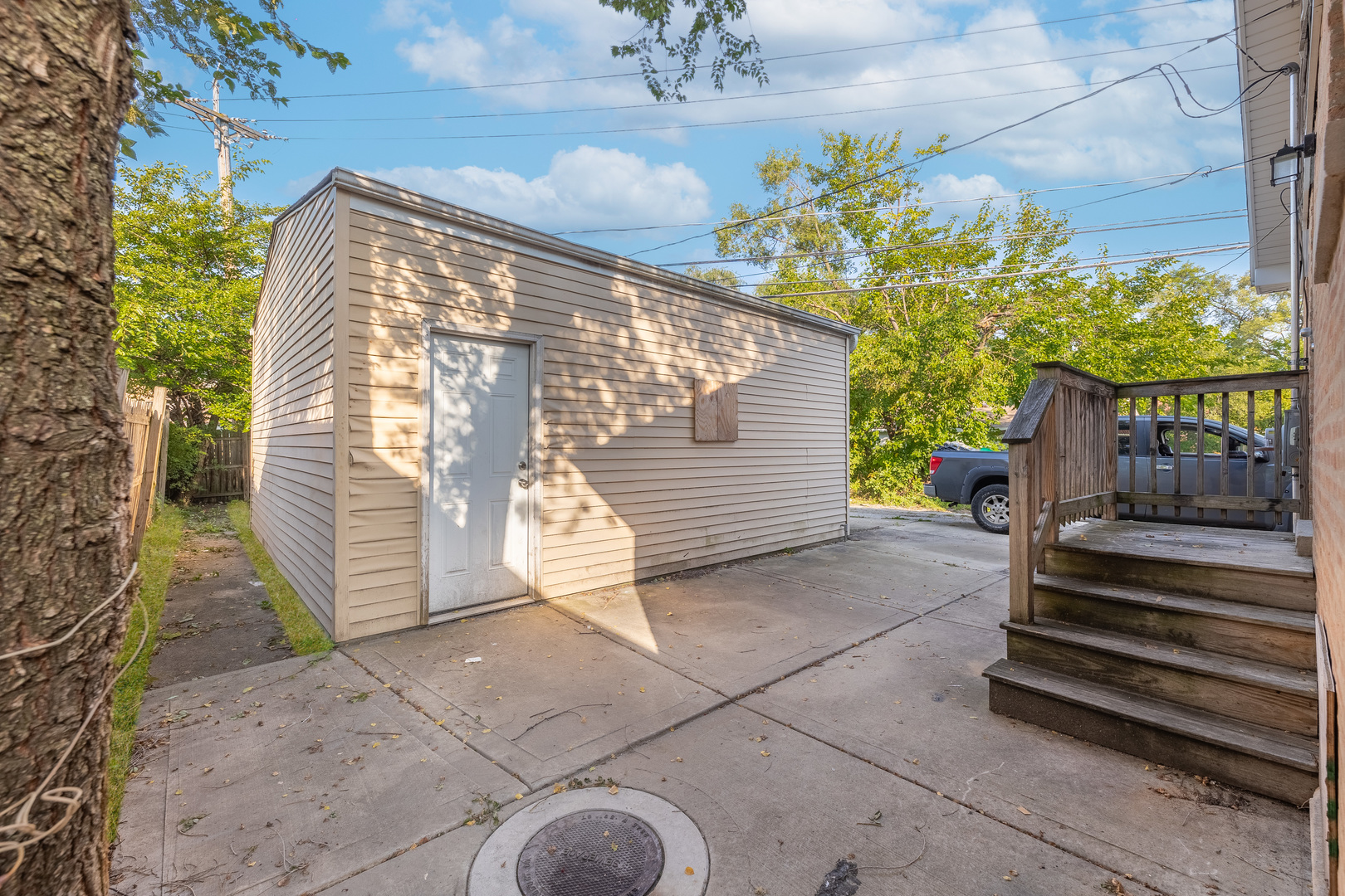 7914 South Troy Street Chicago, IL 60652 - Photo 33 of 35 a view of a house with a door and wooden floor