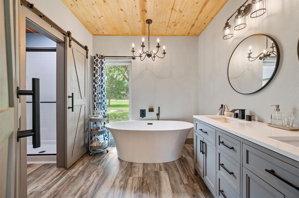 508 Chandler Road Keller, TX 76248 - Photo 18 of 39 a bathroom with a sink and a mirror