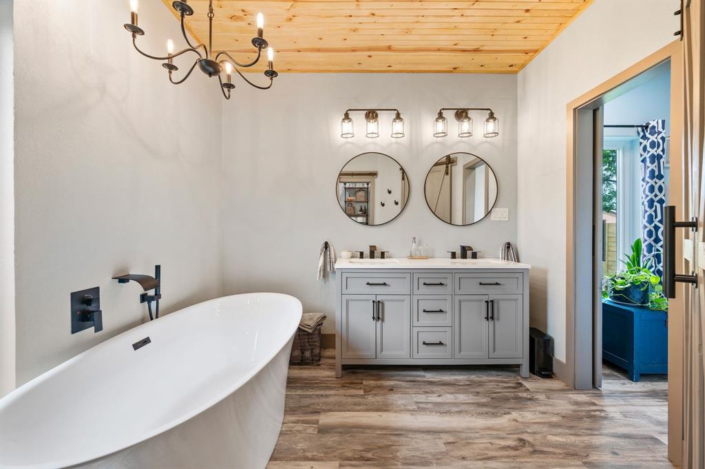 508 Chandler Road Keller, TX 76248 - Photo 19 of 39 a bathroom with a sink and a mirror