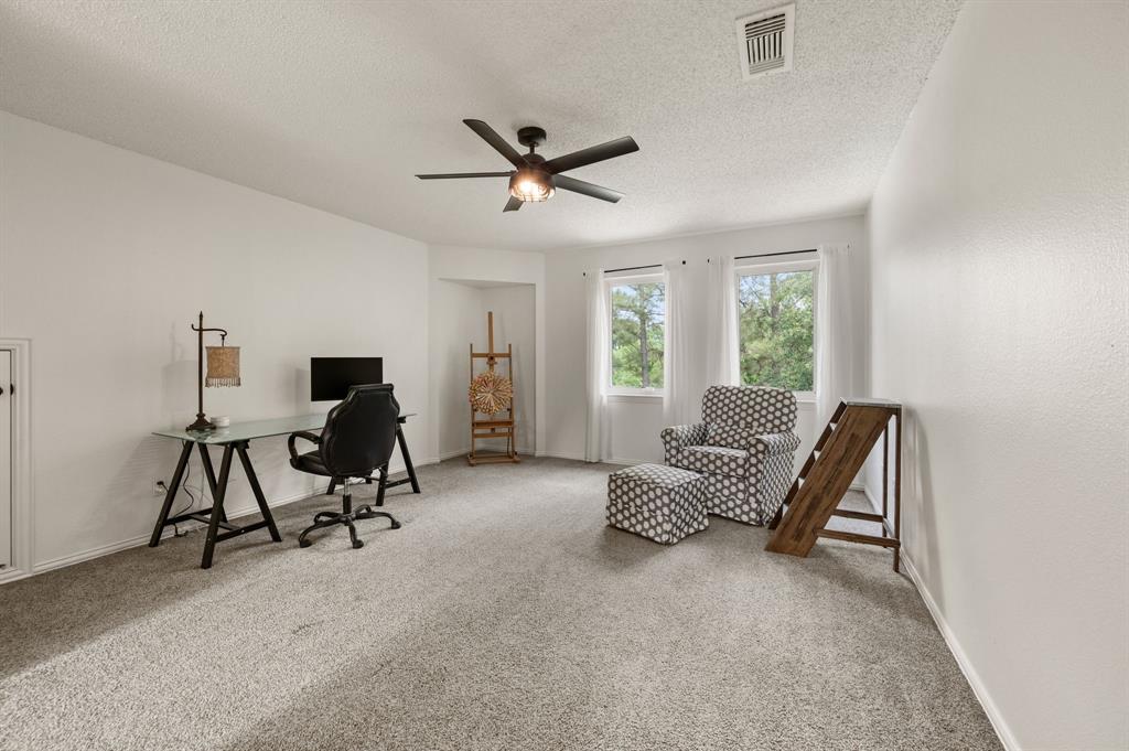 508 Chandler Road Keller, TX 76248 - Photo 23 of 39 a living room with furniture and a window