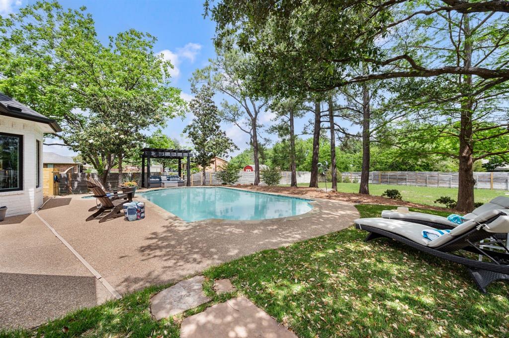 508 Chandler Road Keller, TX 76248 - Photo 28 of 39 a view of a house with swimming pool and sitting area