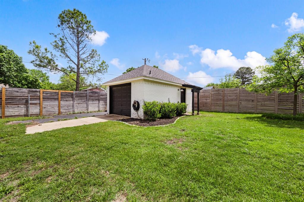 508 Chandler Road Keller, TX 76248 - Photo 31 of 39 a view of a backyard with a garden