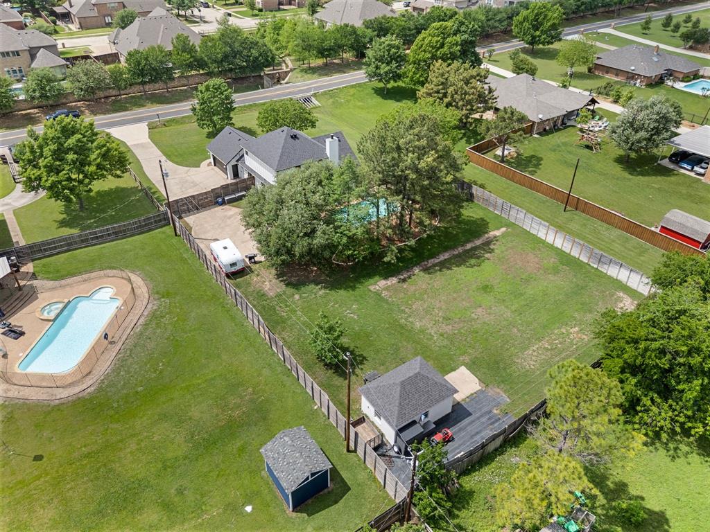 508 Chandler Road Keller, TX 76248 - Photo 34 of 39 an aerial view of a house with outdoor space lake view and large trees