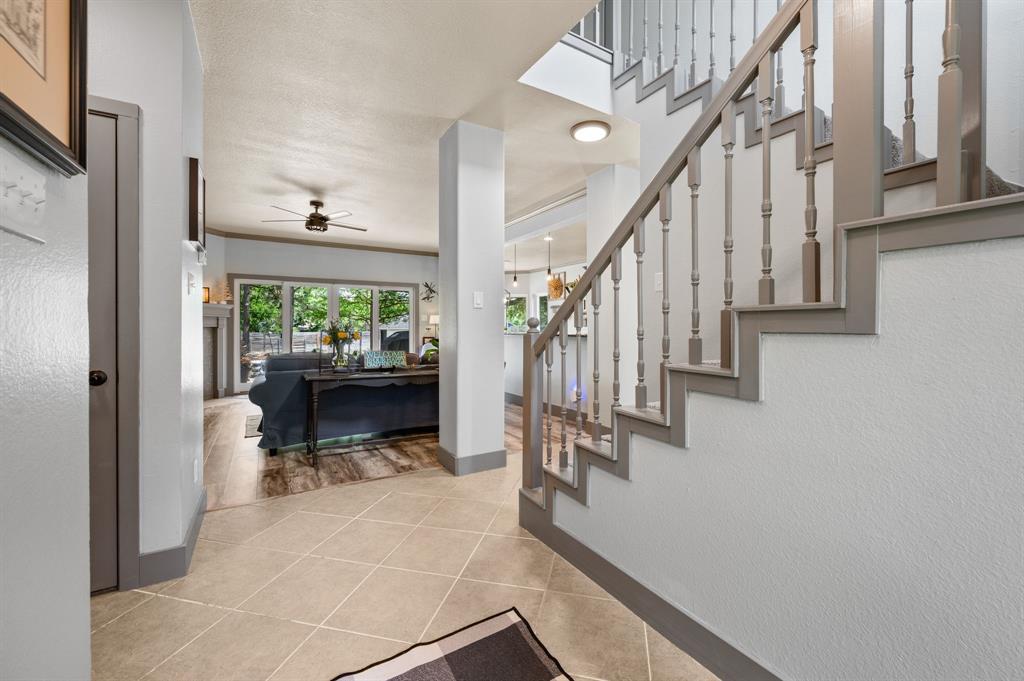 508 Chandler Road Keller, TX 76248 - Photo 5 of 39 a view of entryway and hall with wooden floor