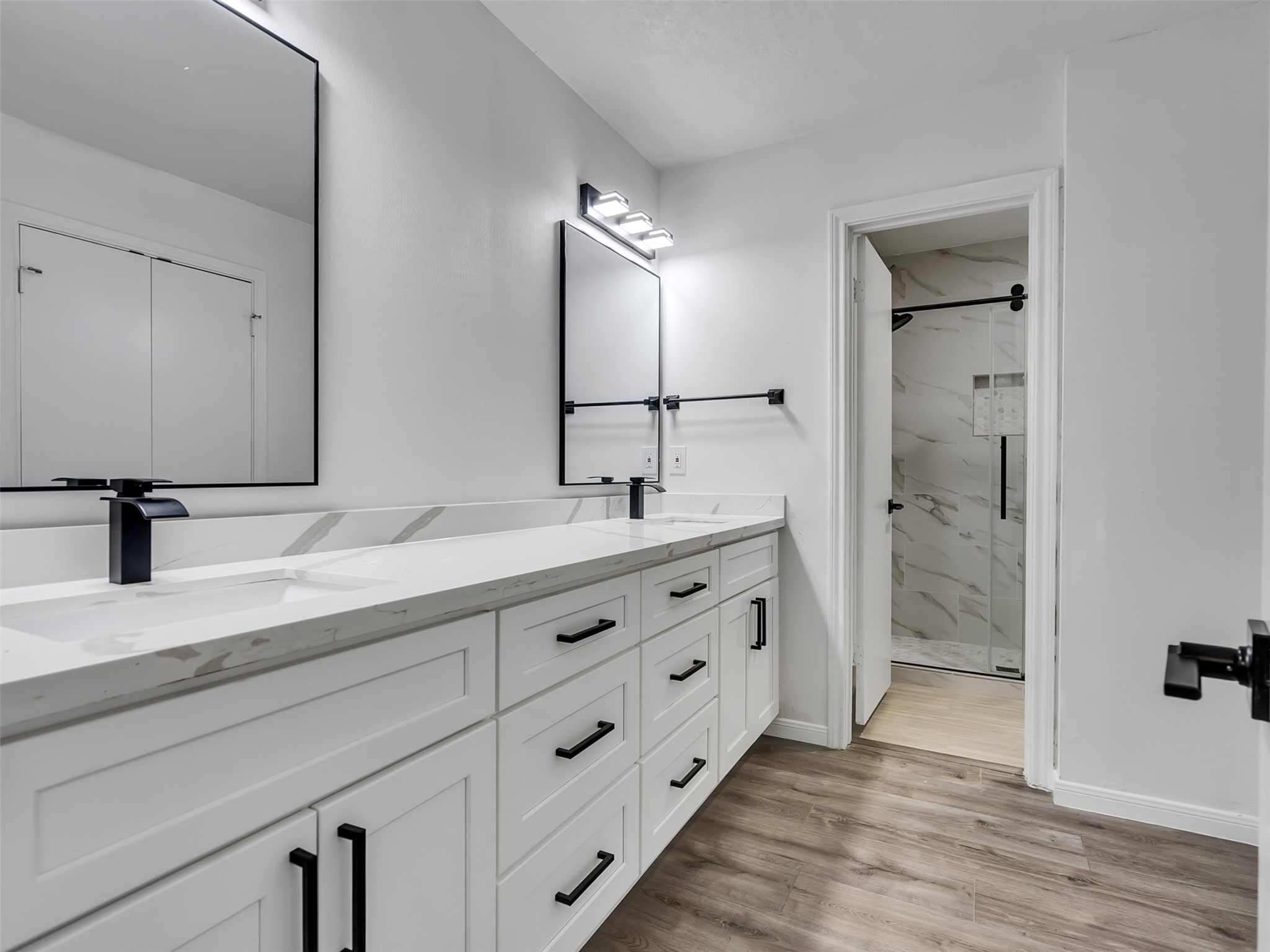 4023 Laverock Road Spring, TX 77388 - Photo 24 of 36 Primary bath with dual sink vanity and modern LED lighting