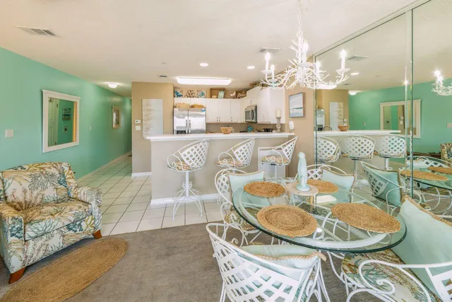 a view of a dining room with furniture
