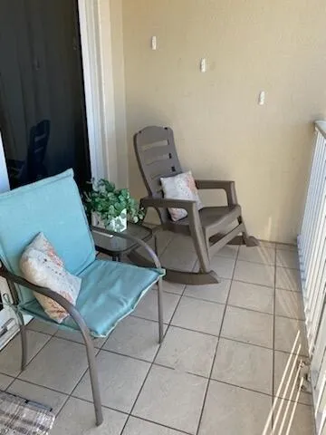 a view of a workspace with furniture