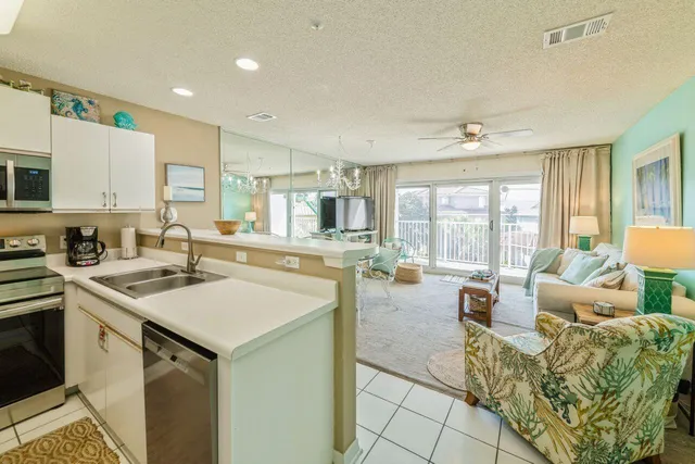 a view of a kitchen center island and windows
