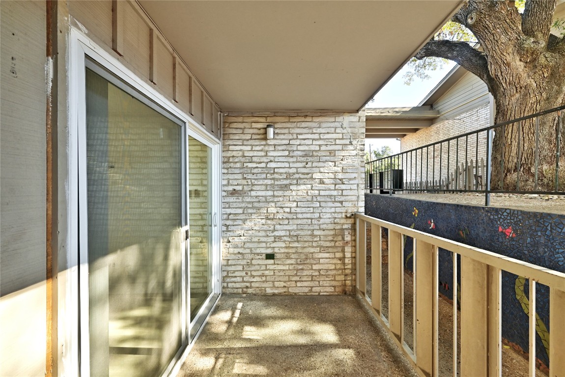 1304 Summit Street, Unit 102 Austin, TX 78741 - Photo 11 of 20 a view of balcony