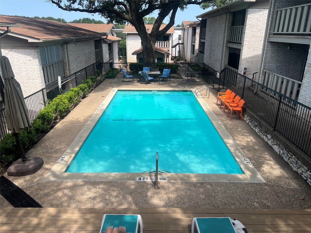 1304 Summit Street, Unit 102 Austin, TX 78741 - Photo 18 of 20 a view of a backyard with a patio