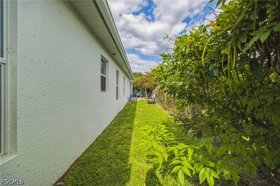 1700 43rd Terrace Southwest Naples, FL 34116 - Photo 34 of 38 a view of a yard