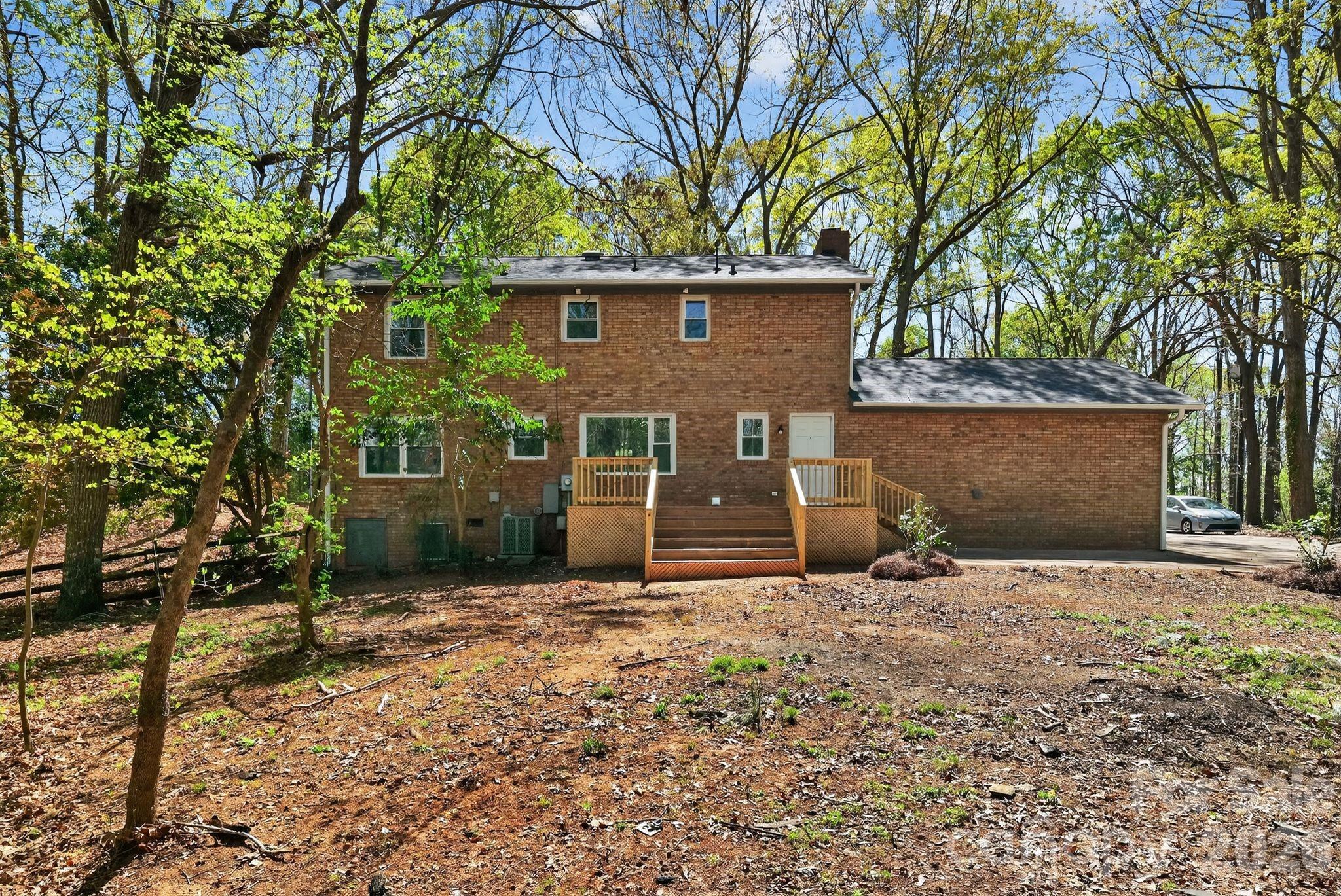 874 Red Fox Lane Concord, NC 28025 - Photo 4 of 17 a view of a house with a yard