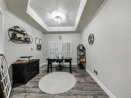 an entryway with a workspace