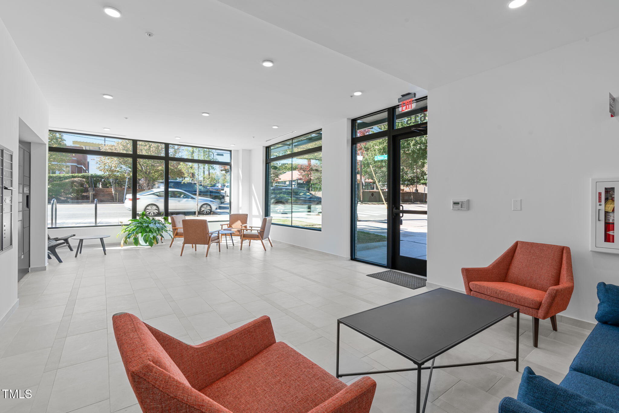 615 West Peace Street, Unit 302 Raleigh, NC 27605 - Photo 33 of 50 a living room with furniture and a large window