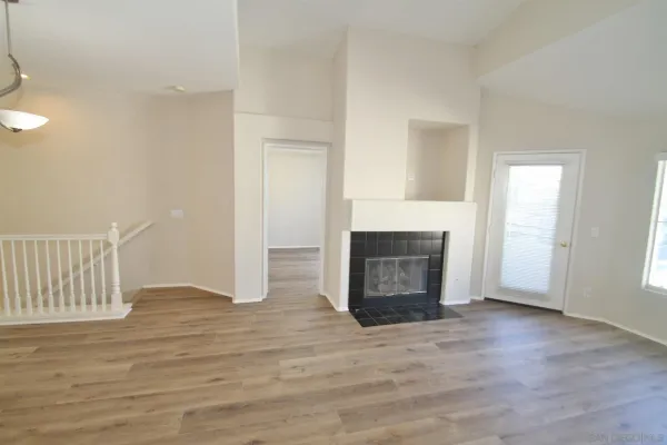 a view of a livingroom with a fireplace and a fireplace
