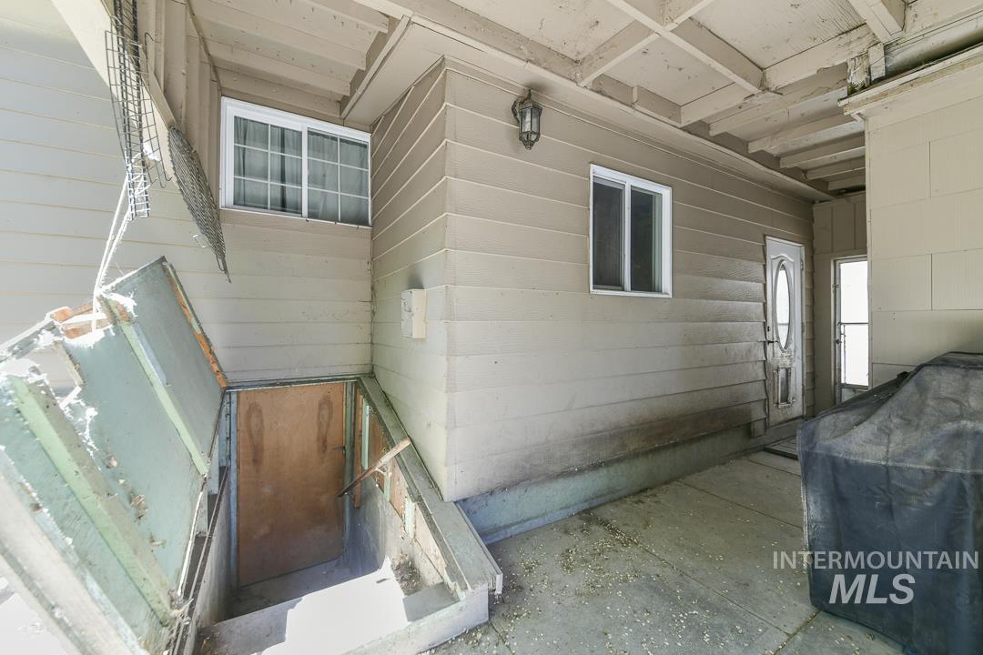 486 West Main Street South Vale, OR 97918 - Photo 26 of 37 Exterior entry with concrete steps and an open cellar door
