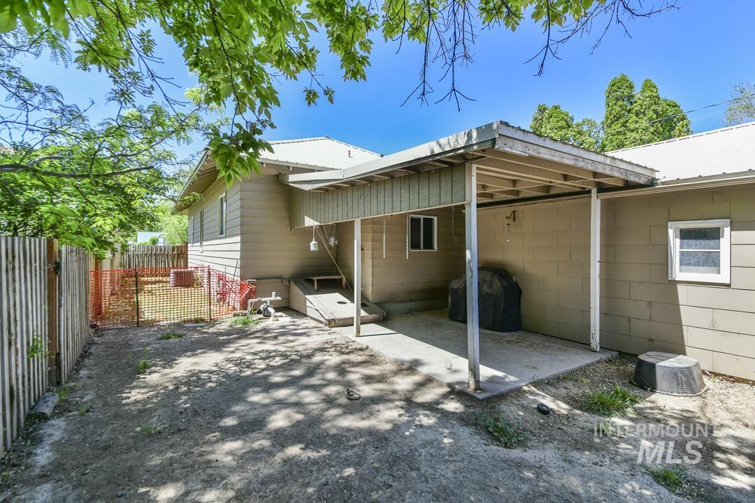 486 West Main Street South Vale, OR 97918 - Photo 31 of 37 Carport structure featuring a corrugated metal roof and concrete slab