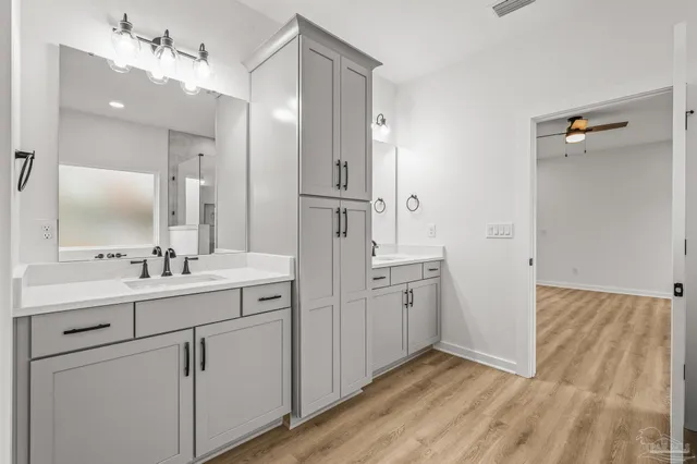 a bathroom with a sink and a shower