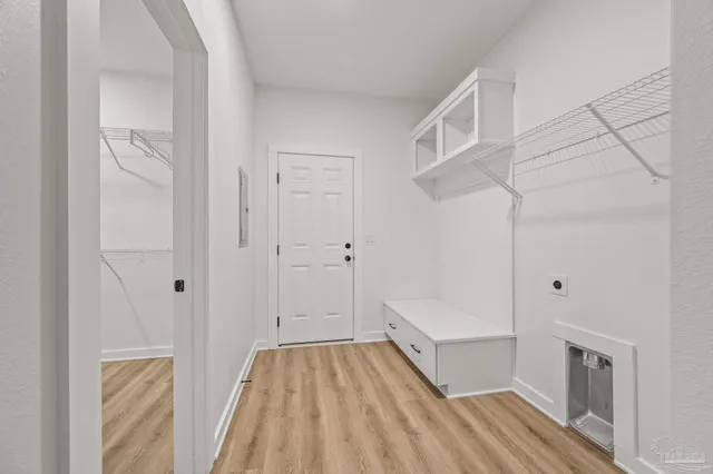 a view of kitchen with wooden floor